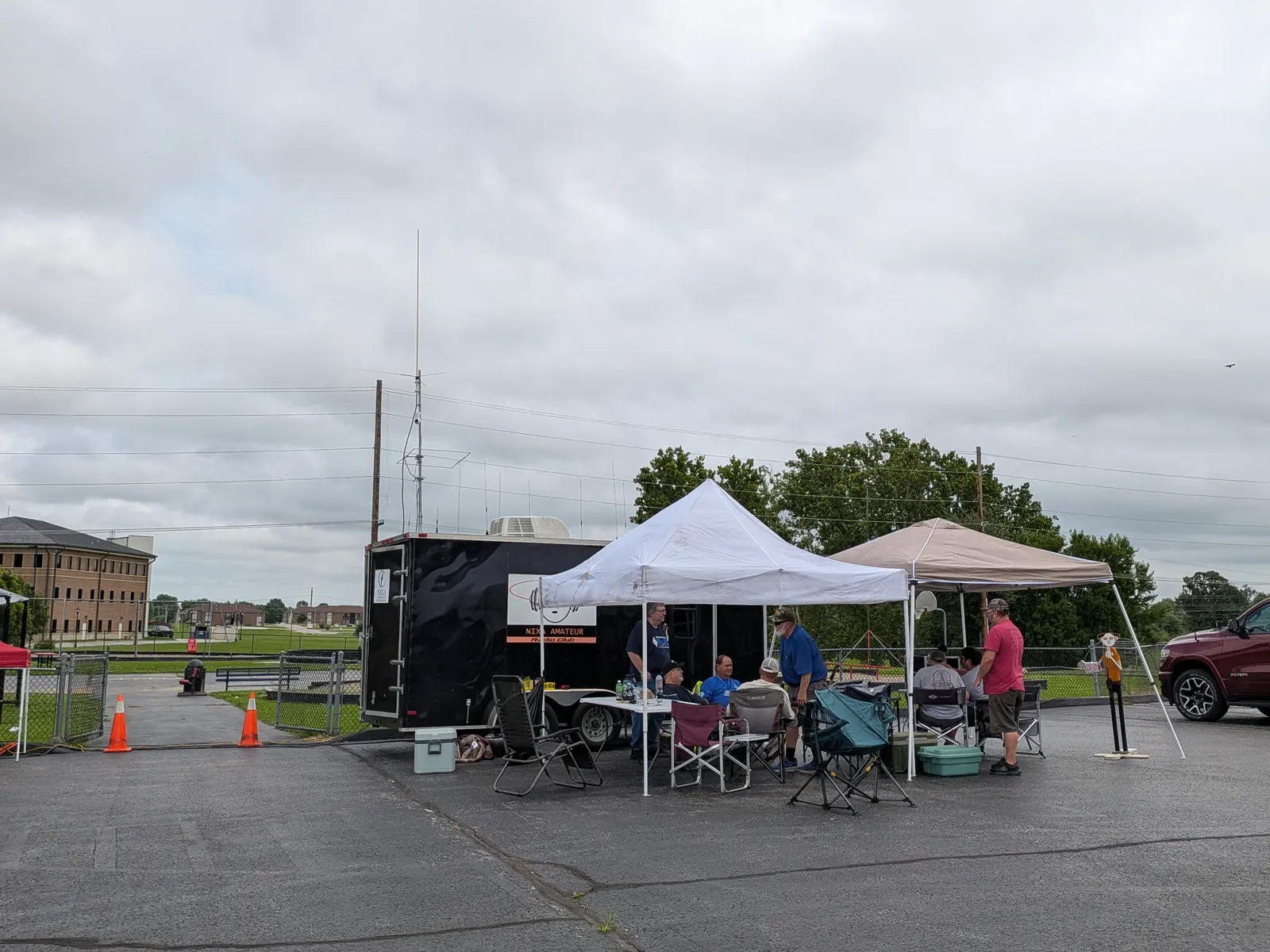 The club communications trailer and canopies set up for Field Day.