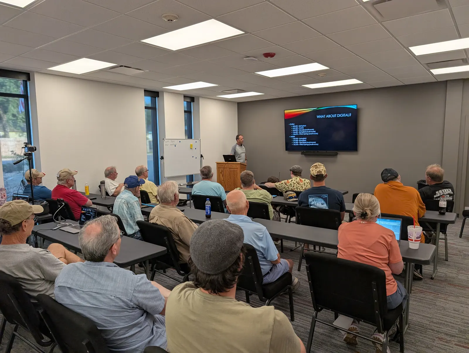 Club members filling a meeting room during a presentation on digital modes.